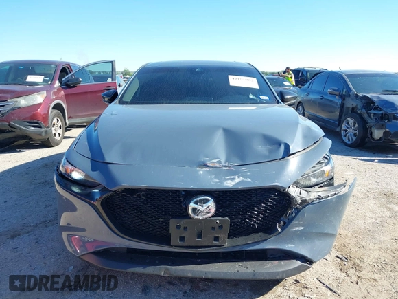 2023 Mazda 3 S Carbon Edition with VIN JM1BPBLM8P1611106, listed as a IAAI auction lot 42191902 with 37,244 mi miles and . Bid and sale history available at DreamBid. Image 12.