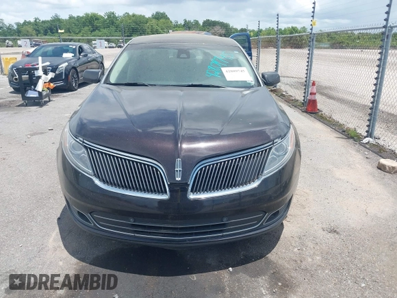 2014 Lincoln MKS with VIN 1LNHL9DK0EG605429, listed as a IAAI auction lot 42809745 with 127,038 mi miles and . Bid and sale history available at DreamBid. Image 12.