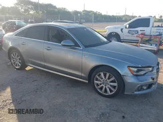 2013 Audi A6 3.0T Prestige with VIN WAUJGAFC6DN131821, listed as a IAAI auction lot 41411463 with 186,380 mi miles. Bid and sale history available at carsss.com. Image 1.