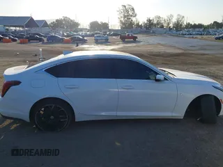 2020 Cadillac CT5 Luxury z VIN 1G6DW5RK9L0128732, wystawiony jako IAAI lot #41958505 z przebiegiem 49 919 mil mil oraz . Historia ofert i sprzedaży dostępna na DreamBid. Obrazek 13.