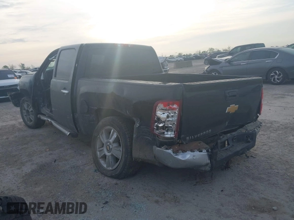 2013 Chevrolet Silverado 1500 LT with VIN 3GCPCSE00DG141940, listed as a IAAI auction lot 41882612 with Not Provided miles. Bid and sale history available at carsss.com. Image 3.