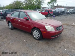 2007 Kia Optima LX with VIN KNAGE123775118716, listed as a IAAI auction lot 42070513 with 199,926 mi miles. Bid and sale history available at carsss.com. Image 1.