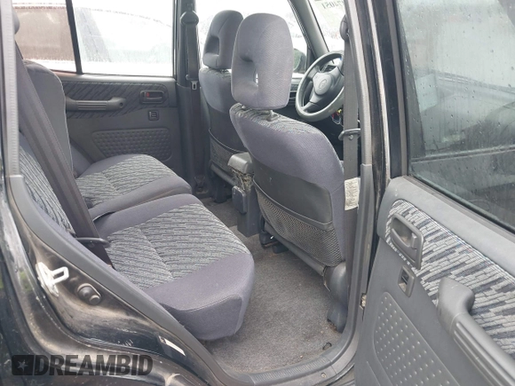 1999 Toyota RAV4 with VIN JT3GP10VXX7061972, listed as a IAAI auction lot 42474051 with 229,406 mi miles and . Bid and sale history available at DreamBid. Image 8.