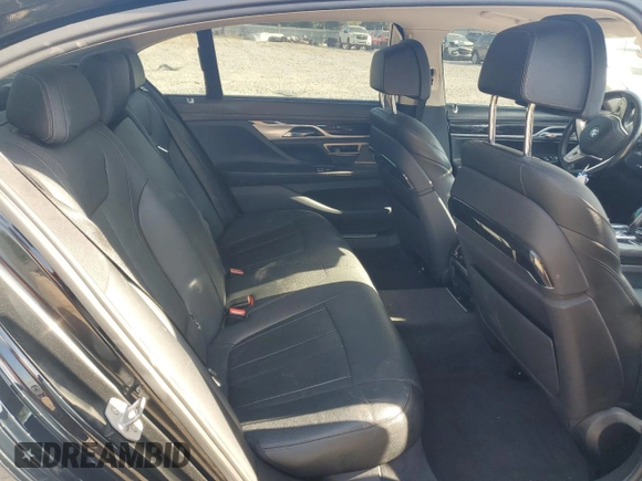 2017 BMW 7 Series 740i with VIN WBA7E2C57HG739482, listed as a Copart auction lot 53652145 with 102,418 mi miles and Salvage title. Bid and sale history available at DreamBid. Image 10.