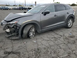 2016 Mazda CX-9 Touring with VIN JM3TCACY1G0120757, listed as a Copart auction lot 87725875 with 123,157 mi miles and Salvage Title. Bid and sale history available at carsss.com. Image 1.