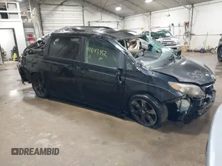 2011 Toyota Sienna SE with VIN 5TDXK3DC1BS172813, listed as a IAAI auction lot 41643352 with 172,385 mi miles. Bid and sale history available at carsss.com. Image 1.