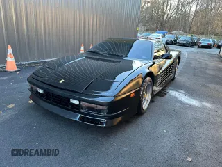 1988 Pontiac Fiero z VIN 1G2PE119XJP213392, wystawiony jako Copart lot #55215415 z przebiegiem 71 246 mil mil oraz Tytuł czysty. Historia ofert i sprzedaży dostępna na DreamBid. Obrazek 2.