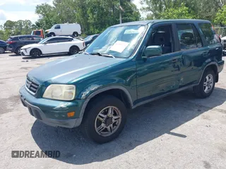 2000 Honda CR-V SE z VIN JHLRD1870YS009867, wystawiony jako IAAI lot #42399220 z przebiegiem 254 367 mil mil oraz . Historia ofert i sprzedaży dostępna na DreamBid. Obrazek 2.