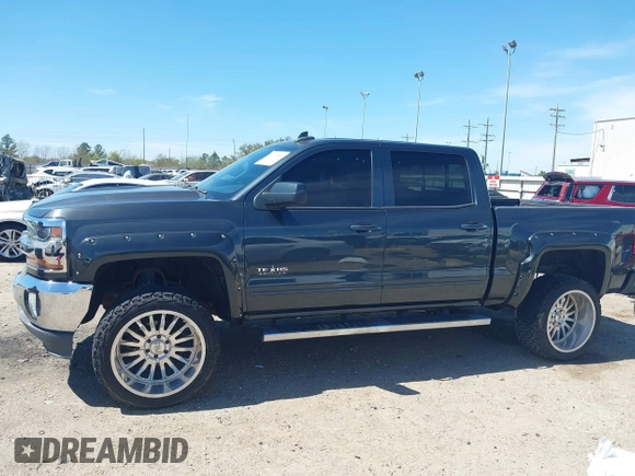 2018 Chevrolet Silverado 1500 LT with VIN 3GCPCREC1JG127396, listed as a IAAI auction lot 41790850 with 138,725 mi miles and . Bid and sale history available at DreamBid. Image 15.
