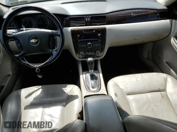 2014 Chevrolet Impala LTZ with VIN 2G1WC5E33E1164638, listed as a Copart auction lot 58699635 with 189,636 mi miles and Salvage title. Bid and sale history available at DreamBid. Image 8.