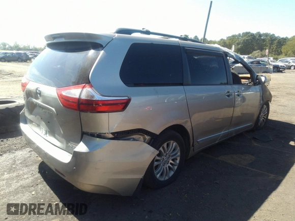 2015 Toyota Sienna XLE with VIN 5TDYK3DC1FS657933, listed as a IAAI auction lot 34212306 with 107,281 mi miles and . Bid and sale history available at DreamBid. Image 4.