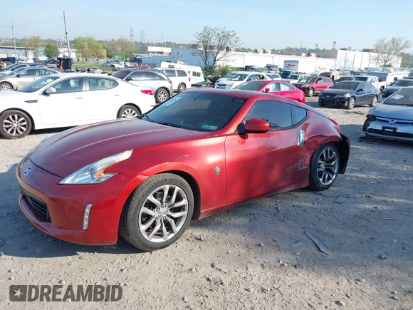 2014 Nissan 370Z Nismo with VIN JN1AZ4EH9EM636340, listed as a IAAI auction lot 42112548 with 143,894 mi miles and . Bid and sale history available at DreamBid. Image 18.