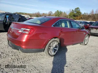 2014 Ford Taurus Limited with VIN 1FAHP2F81EG183128, listed as a Copart auction lot 82409384 with 107,624 mi miles and Salvage title. Bid and sale history available at DreamBid. Image 3.