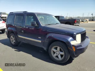 2012 Jeep Liberty Sport with VIN 1C4PJMAK5CW182377, listed as a Copart auction lot 57671345 with 140,236 mi miles and Salvage title. Bid and sale history available at DreamBid. Image 4.