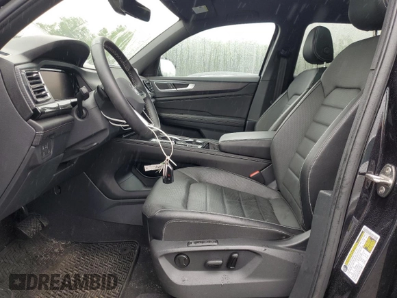 2024 Volkswagen Atlas SEL with VIN 1V2BE2CA2RC231602, listed as a Copart auction lot 59927465 with 16,022 mi miles and Salvage title. Bid and sale history available at DreamBid. Image 7.