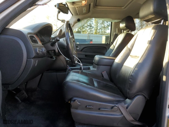 2014 Chevrolet Suburban LT with VIN 1GNSKJE76ER208747, listed as a Copart auction lot 74501524 with 196,971 mi miles and Salvage Title. Bid and sale history available at carsss.com. Image 7.