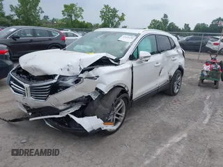 2017 Lincoln MKC Reserve with VIN 5LMCJ3D9XHUL55999, listed as a IAAI auction lot 42691155 with Not provided miles and . Bid and sale history available at DreamBid. Image 17.