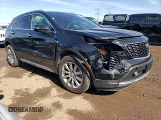 2021 Cadillac XT4 AWD Premium Luxury with VIN 1GYFZDR41MF002835, listed as a Copart auction lot 49384424 with 9,984 mi miles and Salvage Title. Bid and sale history available at carsss.com. Image 4.