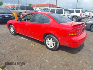 2003 Oldsmobile Alero GL1 z VIN 1G3NL52F43C211667, wystawiony jako IAAI lot #42249590 z przebiegiem Nie podano mil oraz . Historia ofert i sprzedaży dostępna na DreamBid. Obrazek 3.