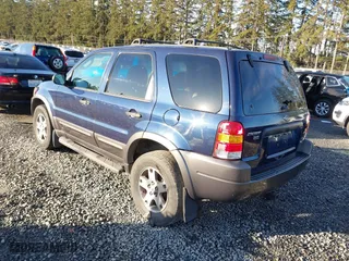 2004 Ford Escape XLT with VIN 1FMYU03134KA30806, listed as a IAAI auction lot 41449933 with 137,897 mi miles. Bid and sale history available at carsss.com. Image 3.