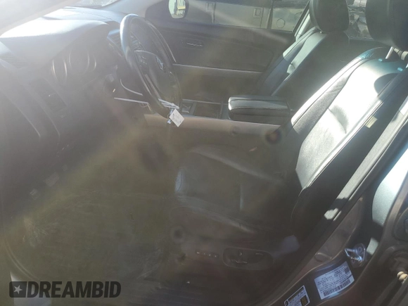 2012 Mazda CX-9 Grand Touring z VIN JM3TB3DAXC0347861, wystawiony jako Copart lot #81166894 z przebiegiem 172 465 mil mil oraz Szkoda całkowita • Salvage title. Historia ofert i sprzedaży dostępna na DreamBid. Obrazek 7.