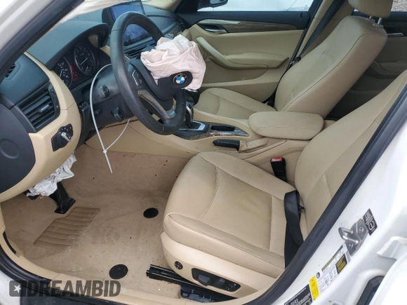 2014 BMW X1 sDrive28i z VIN WBAVM1C56EVW46769, wystawiony jako Copart lot #55341965 z przebiegiem 82 805 mil mil oraz Szkoda całkowita • Salvage title. Historia ofert i sprzedaży dostępna na DreamBid. Obrazek 7.