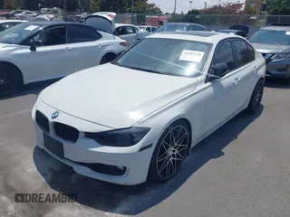 2014 BMW 3 Series 328i with VIN WBA3C1C52EK110753, listed as a IAAI auction lot 42444129 with 169,035 mi miles and . Bid and sale history available at DreamBid. Image 6.