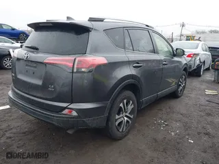 2018 Toyota RAV4 LE with VIN JTMBFREV0JJ223957, listed as a IAAI auction lot 41652810 with 144,629 mi miles. Bid and sale history available at carsss.com. Image 4.
