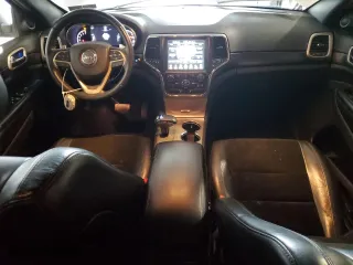 2015 Jeep Grand Cherokee Laredo with VIN 1C4RJFAG2FC828769, listed as a Copart auction lot 86611744 with 84,616 mi miles and Salvage Title. Bid and sale history available at carsss.com. Image 8.