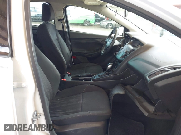 2018 Ford Focus S with VIN 1FADP3E26JL205370, listed as a IAAI auction lot 42083989 with 91,401 mi miles and . Bid and sale history available at DreamBid. Image 5.