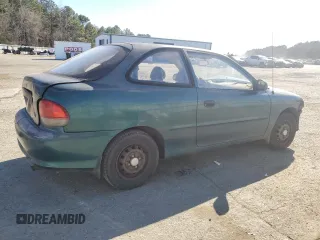 1999 Hyundai Accent z VIN KMHVD14N4XU456698, wystawiony jako Copart lot #41733345 z przebiegiem 197 574 mil mil oraz Szkody całkowita. Historia ofert i sprzedaży dostępna na DreamBid. Obrazek 3.