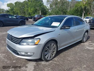 2015 Volkswagen Passat 1.8T SE w/Sunroof & Nav with VIN 1VWBT7A31FC105636, listed as a IAAI auction lot 41211815 with 64,684 mi miles. Bid and sale history available at carsss.com. Image 17.