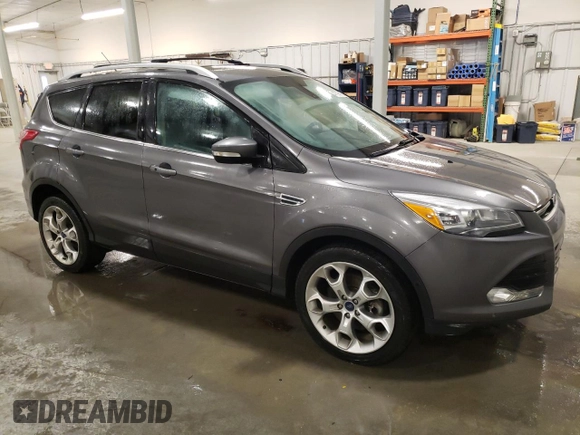 2014 Ford Escape Titanium with VIN 1FMCU9J95EUA84671, listed as a Copart auction lot 47398165 with 84,453 mi miles and Salvage Title. Bid and sale history available at DreamBid. Image 4.