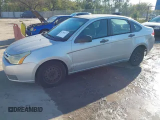 2009 Ford Focus S with VIN 1FAHP34N79W221813, listed as a IAAI auction lot 41758471 with 248,531 mi miles. Bid and sale history available at carsss.com. Image 2.