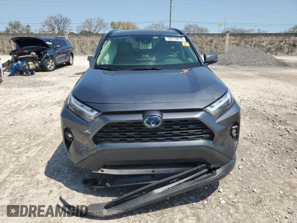 2023 Toyota RAV4 Hybrid XLE Premium z VIN JTMB6RFV2PD105642, wystawiony jako Copart lot #50714615 z przebiegiem Nie podano mil oraz Szkoda całkowita • Salvage title. Historia ofert i sprzedaży dostępna na DreamBid. Obrazek 5.