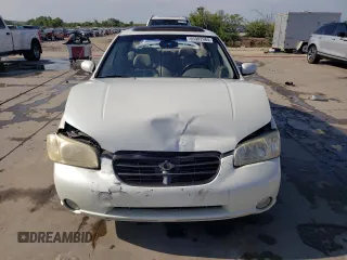 2000 Nissan Maxima GXE z VIN JN1CA31D2YT523871, wystawiony jako Copart lot #65902984 z przebiegiem 235 064 mil mil oraz Szkoda całkowita • Salvage title. Historia ofert i sprzedaży dostępna na DreamBid. Obrazek 5.