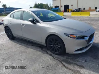 2024 Mazda 3 S Select Sport with VIN 3MZBPABM4RM428056, listed as a IAAI auction lot 41988846 with 15,060 mi miles and . Bid and sale history available at DreamBid. Image 1.