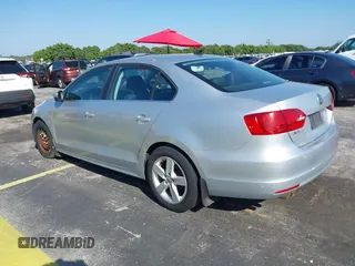 2013 Volkswagen Jetta TDI w/Premium with VIN 3VWLL7AJ0DM385077, listed as a IAAI auction lot 42322406 with 63,428 mi miles and . Bid and sale history available at DreamBid. Image 3.