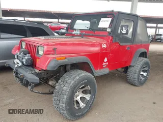 1994 Jeep Wrangler with VIN 1J4FY29S1RP437913, listed as a IAAI auction lot 42185965 with 245,618 mi miles and . Bid and sale history available at DreamBid. Image 2.