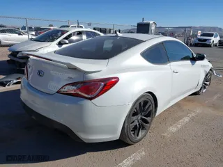 2013 Hyundai Genesis Coupe 3.8 R-Spec with VIN KMHHU6KJ2DU101504, listed as a IAAI auction lot 41469836 with 98,779 mi miles. Bid and sale history available at carsss.com. Image 4.
