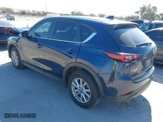 2023 Mazda CX-5 2.5 S Select Package with VIN JM3KFBBM7P0148375, listed as a IAAI auction lot 41624696 with 56,754 mi miles. Bid and sale history available at carsss.com. Image 3.