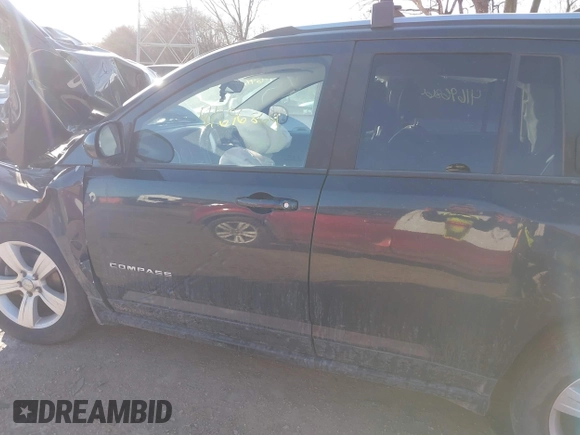 2014 Jeep Compass Latitude with VIN 1C4NJDEB7ED623202, listed as a IAAI auction lot 41696864 with 89,129 mi miles. Bid and sale history available at carsss.com. Image 14.