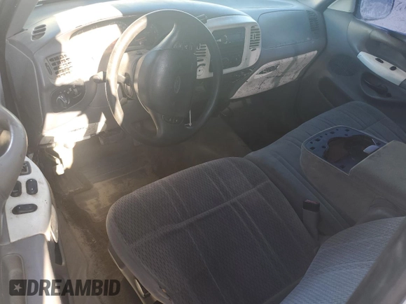 1998 Ford F-150 with VIN 1FTZF18W3WNB98041, listed as a Copart auction lot 77530824 with 194,712 mi miles and Salvage title. Bid and sale history available at DreamBid. Image 8.