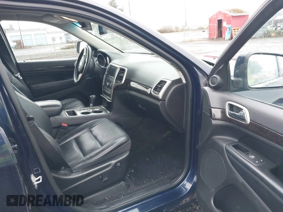 2012 Jeep Grand Cherokee Laredo with VIN 1C4RJFAG9CC220145, listed as a IAAI auction lot 41798457 with 130,603 mi miles. Bid and sale history available at carsss.com. Image 5.
