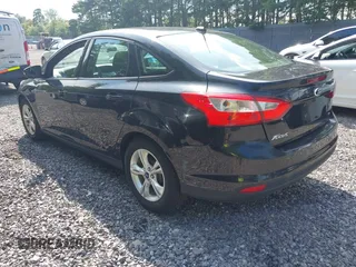 2013 Ford Focus SE with VIN 1FADP3F21DL180199, listed as a IAAI auction lot 42768802 with 125,095 mi miles and . Bid and sale history available at DreamBid. Image 3.