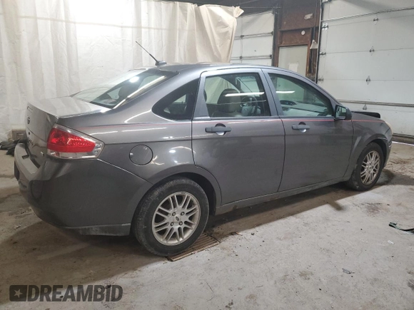 2009 Ford Focus SE with VIN 1FAHP35N59W222036, listed as a Copart auction lot 51323355 with 186,429 mi miles and Salvage Title. Bid and sale history available at carsss.com. Image 3.