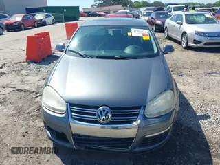 2009 Volkswagen Jetta Sedan SE with VIN 3VWRM71K09M175327, listed as a IAAI auction lot 41983924 with 217,285 mi miles. Bid and sale history available at carsss.com. Image 6.