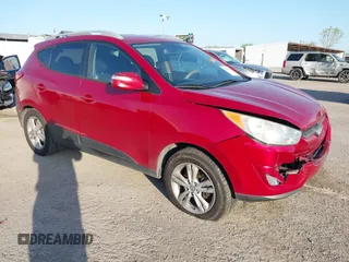 2013 Hyundai Tucson GLS with VIN KM8JU3AC6DU763590, listed as a IAAI auction lot 41999555 with 149,960 mi miles. Bid and sale history available at carsss.com. Image 1.