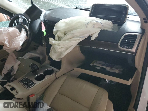 2014 Jeep Grand Cherokee Limited with VIN 1C4RJFBG0EC111736, listed as a Copart auction lot 51604645 with Not provided miles and Salvage title. Bid and sale history available at DreamBid. Image 8.