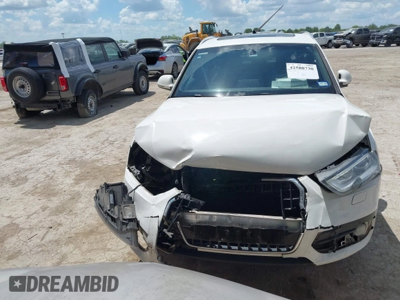 2015 Audi Q3 Prestige with VIN WA1GFCFS1FR007092, listed as a IAAI auction lot 42588730 with 85,290 mi miles and . Bid and sale history available at DreamBid. Image 12.